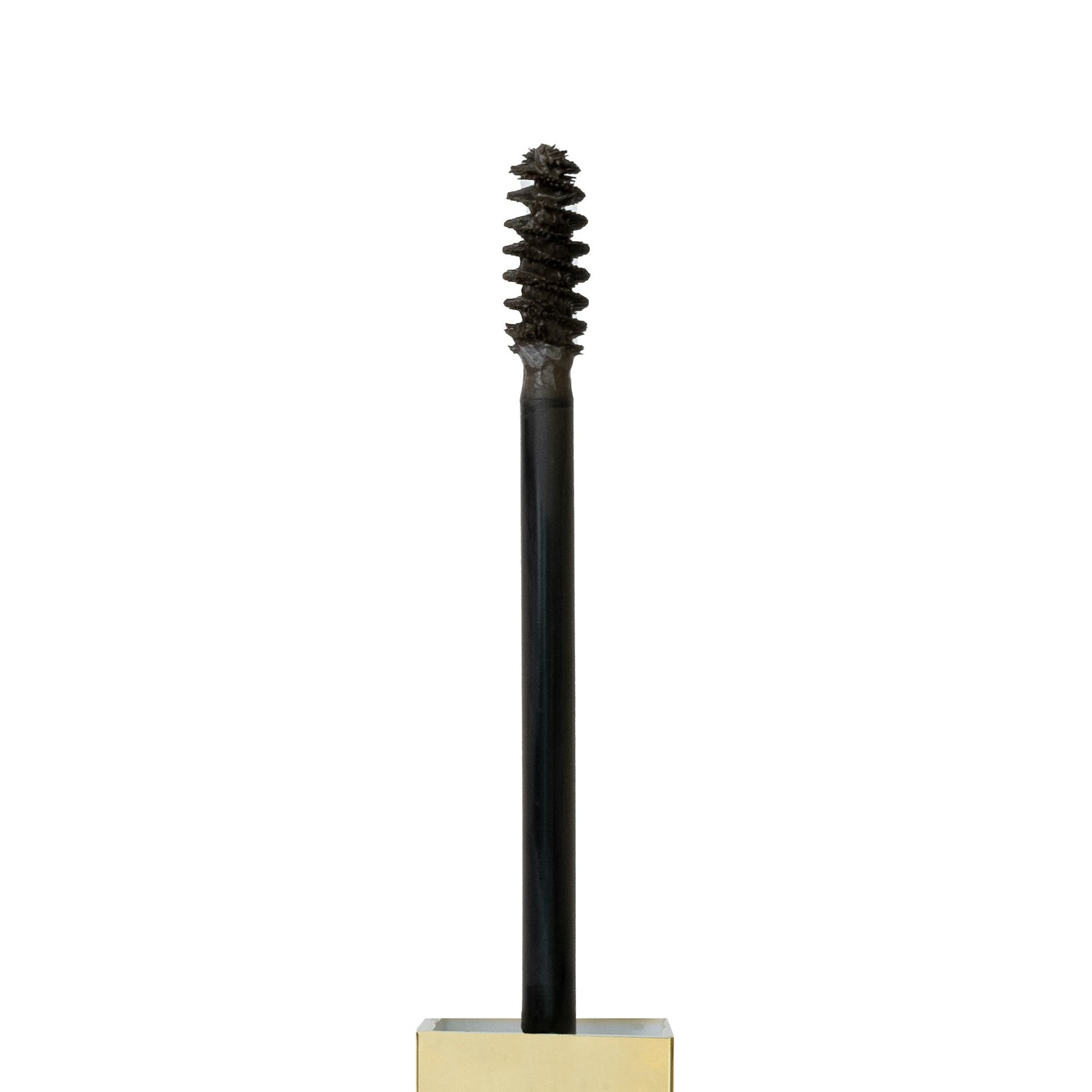 Close up shot of spoolie with Tinted Multi-Peptide Brow Gel - Color-Soft Brown